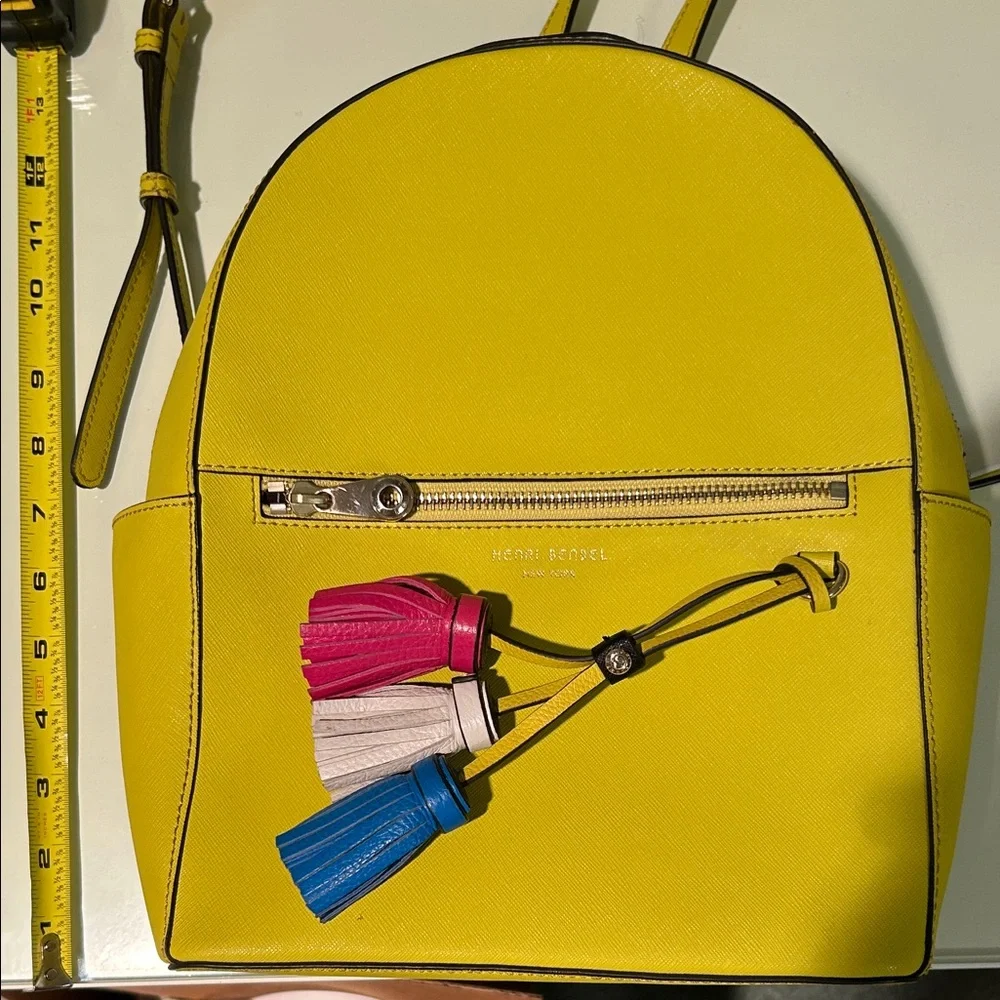 Henri Bendel West 57th Yellow Saffiano Leather Backpack with Colorful Tassels